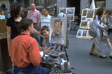 Maler mit Kind auf den Rambla